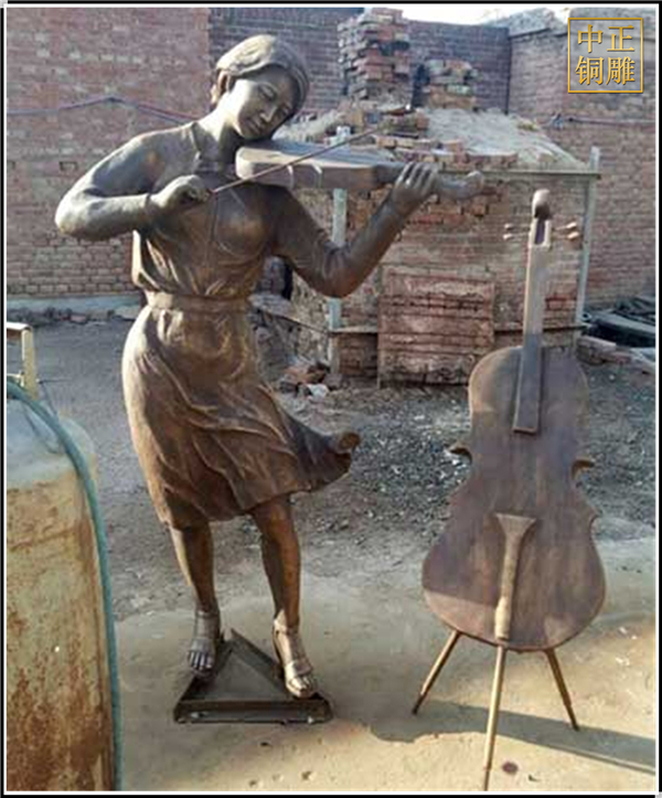 街頭表演人物銅雕塑.jpg