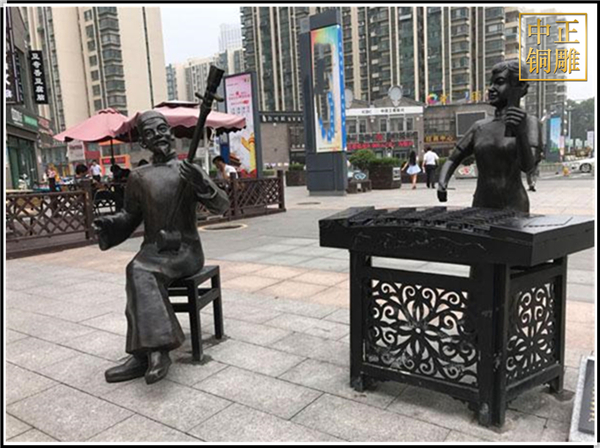 街邊彈曲人物銅雕塑.jpg 街邊彈曲人物銅雕塑.jpg